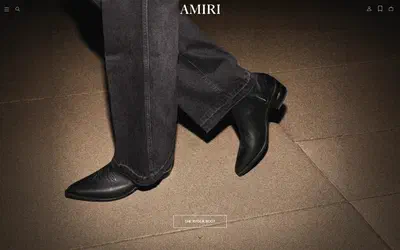 Amiri homepage on desktop, Shopify luxury fashion storefront captured at 1440 x 900