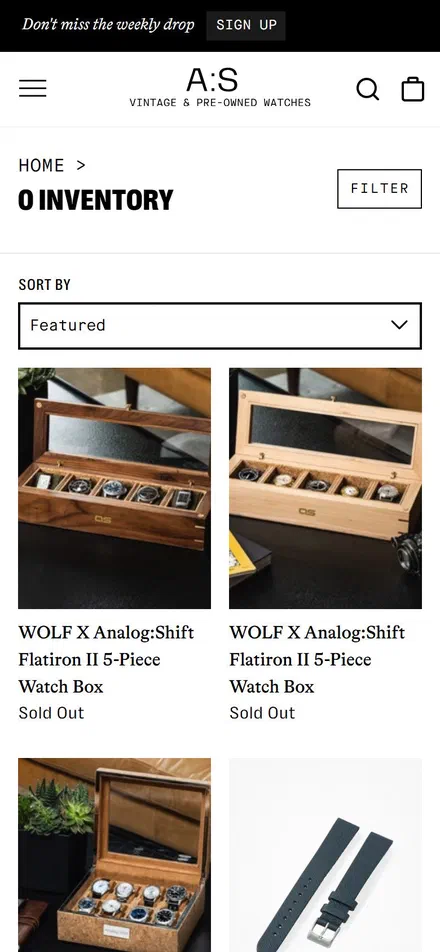 Analog Shift collection: 0 inventory on mobile, Shopify luxury retail storefront captured at 390 x 844